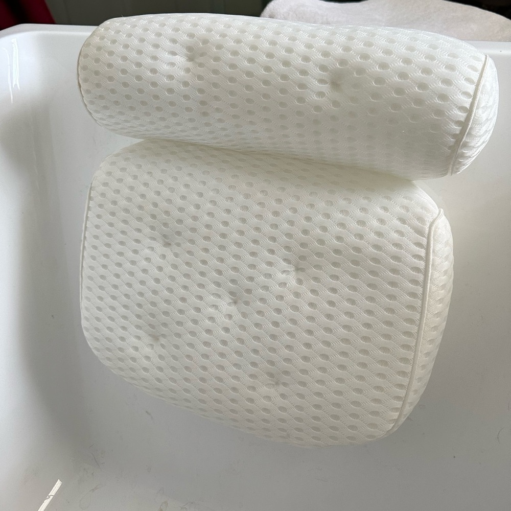 - Never used bathtub pillow